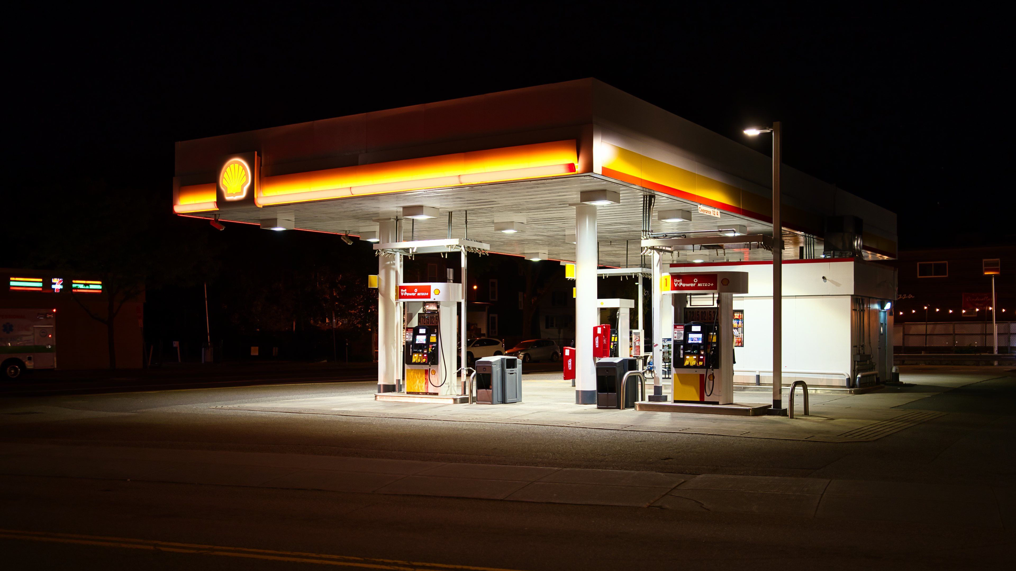 A gas station canopy lit up at night